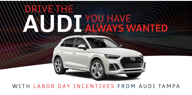 Ivory white Audi SUV showcasing Labor Day Incentives at Audi Tampa