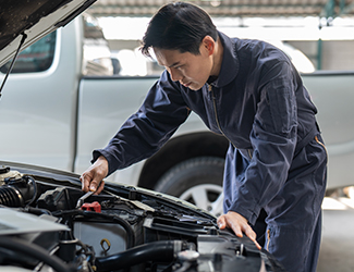 mechanic working on car