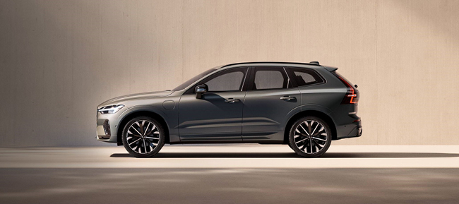 Side view of a gray Volvo with awards in the photo