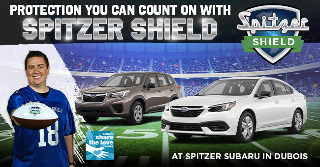 2 Subaru Cars on Football Field