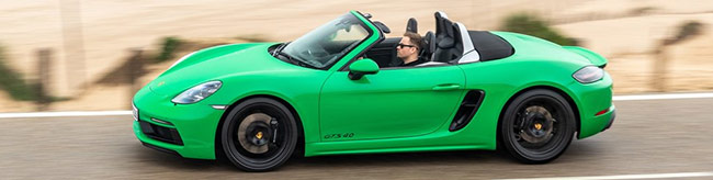 a blue Porsche and a green Porsche