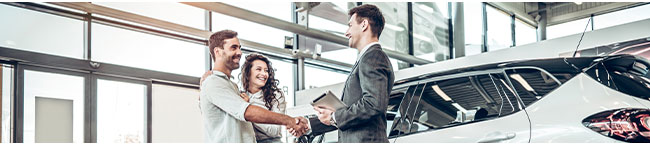 people in car showroom