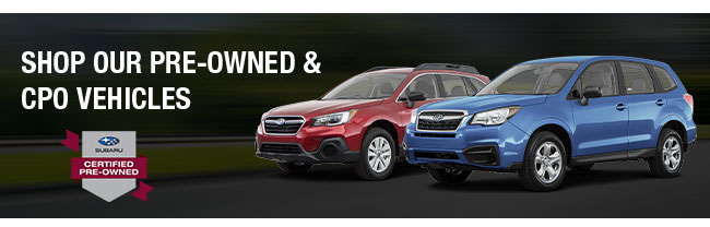 2 Pre-Owned Subaru vehicles parked
