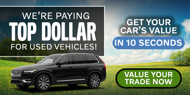 Were paying top dollar for used vehicles - Value your trade now