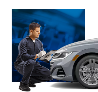 technician checking a car