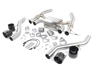 Gray BMW SUV driving though water on a beach