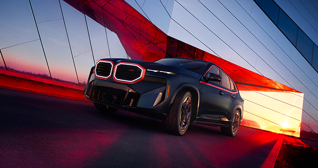 Front view of a black premium BMW SUV 