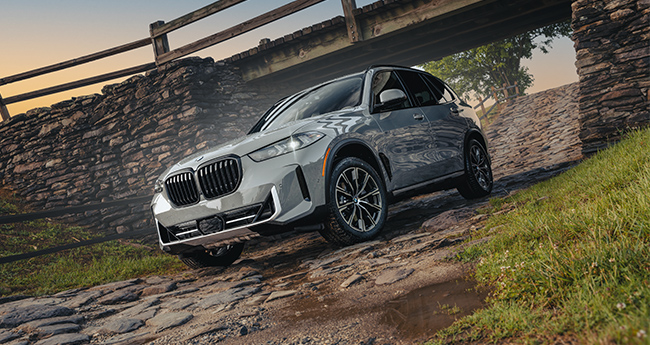 Front view of a black premium BMW SUV 