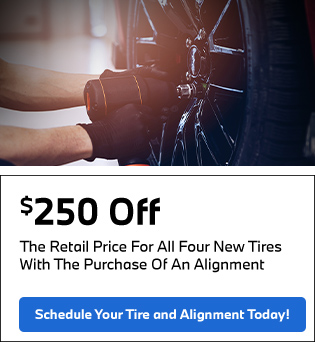 the retail price for all four new tires with the purchase of an alignment