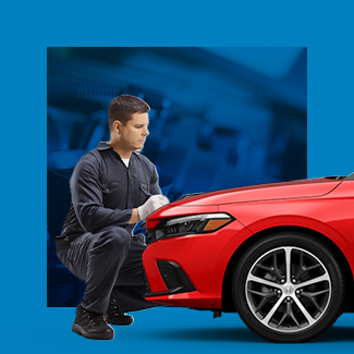 Man checking on a car