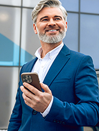 smiling man with phone