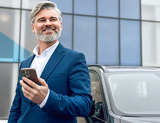 smiling guy with phone