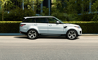 Side view of a white Land Rover SUV