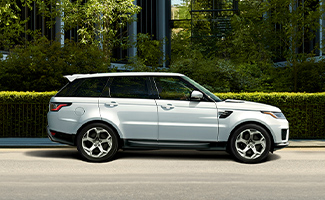 Side view of a white Land Rover SUV