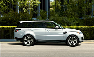 Side view of a white Land Rover SUV