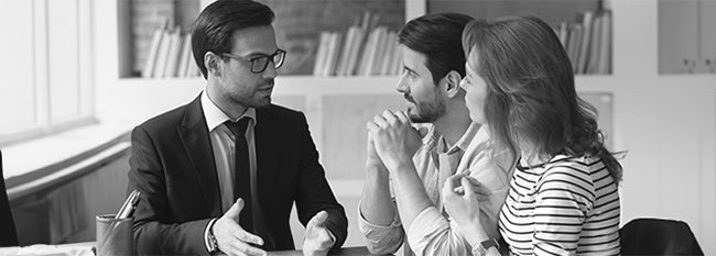 Image of a couple talking to a sales person