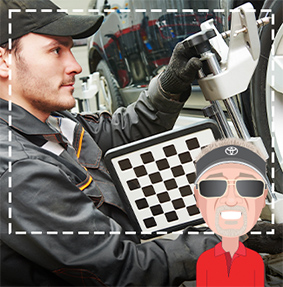 Mechanic looking at a tire